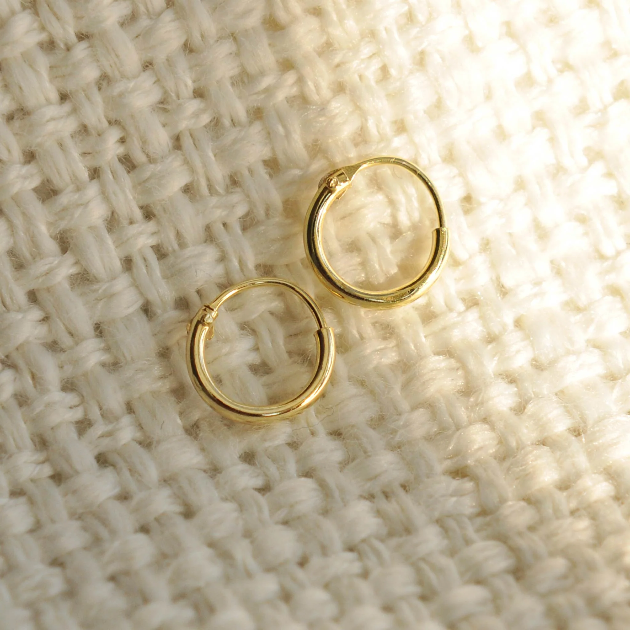 Amber 6mm to 7mm gold effect small huggie hoops - Image 2