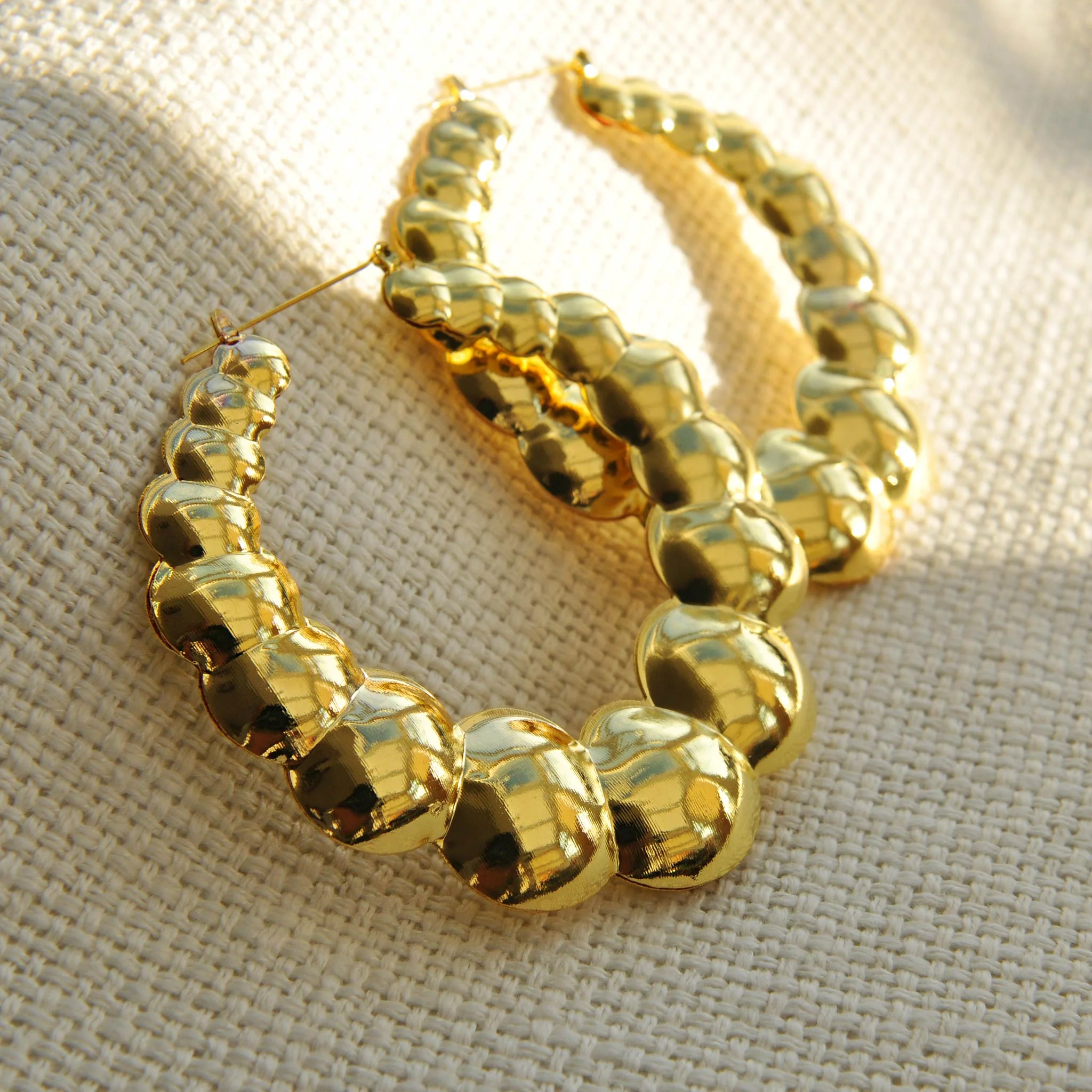 Riri gold effect statement hoops - Image 4